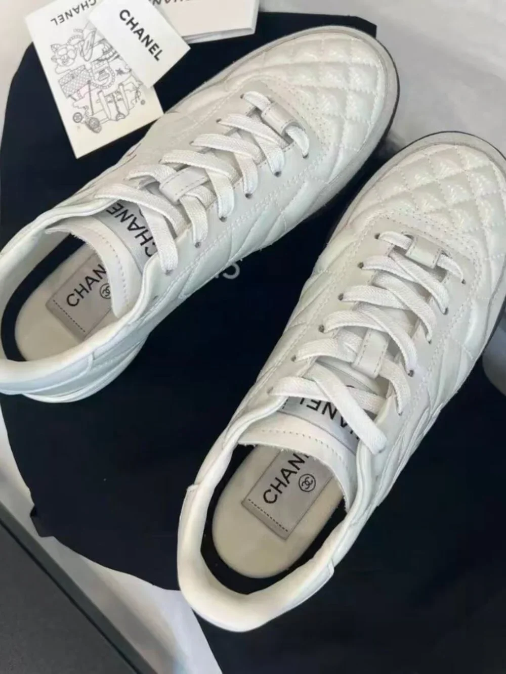 Chanel White Quilted CC Logo Leather & Suede Low‑Top Sneakers